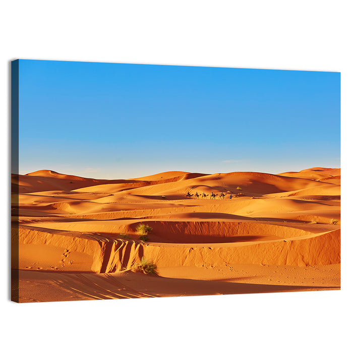 Sunlit Sahara Dunes with Camel Caravan Wall Art as a canvas print