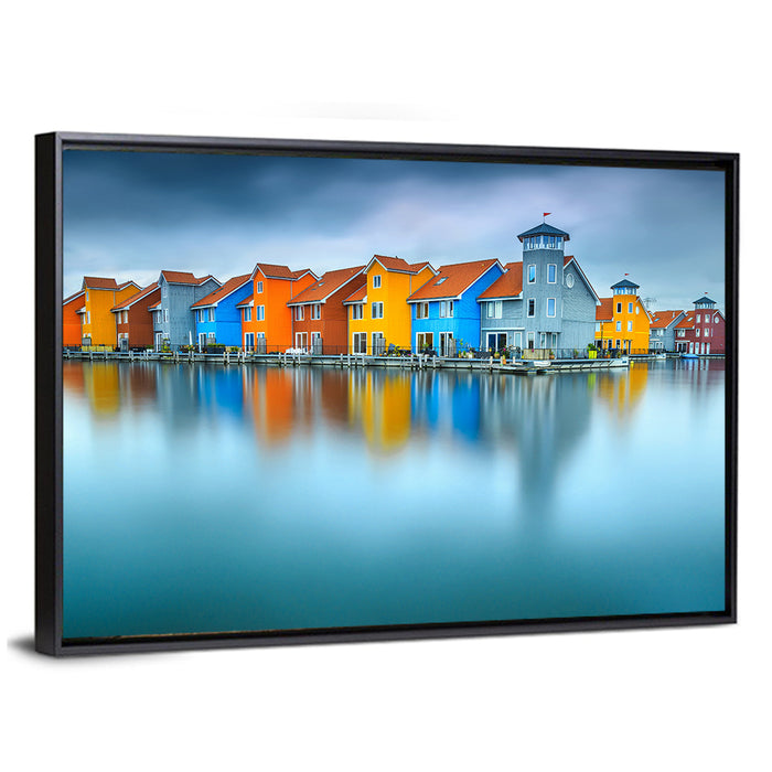 Colorful Waterfront Houses Wall Art as a framed canvas