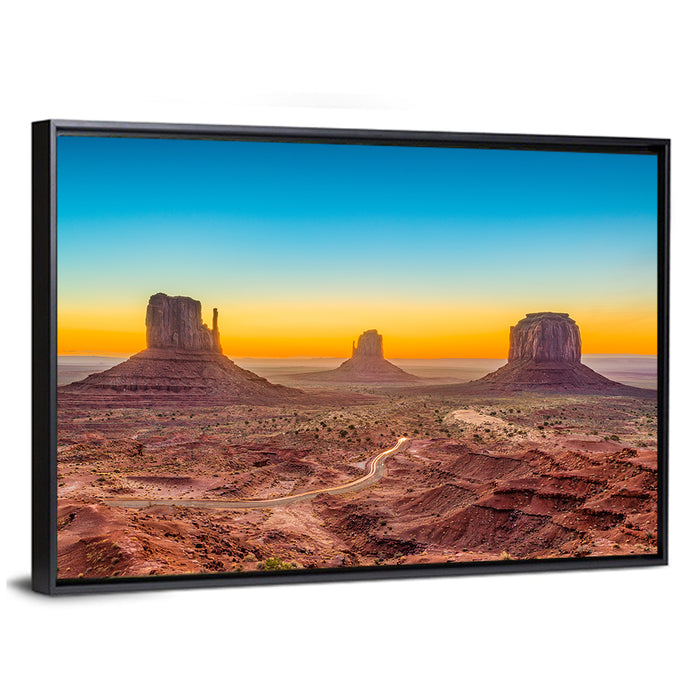 Monument Valley Sunrise with Winding Road Wall Art as a framed canvas