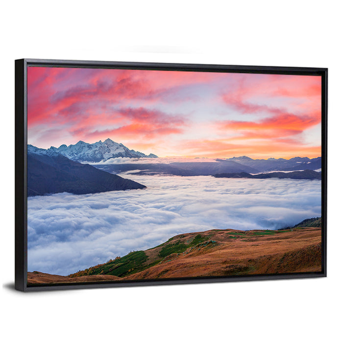 Mt Tetnuld Sunrise Over Clouds Wall Art as a framed canvas
