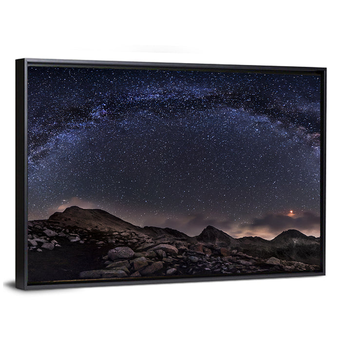 Milky Way Over Mountain Ridge Wall Art as a framed canvas