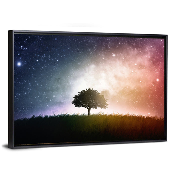 Tree Silhouette Under Nebula Sky Wall Art as a framed canvas