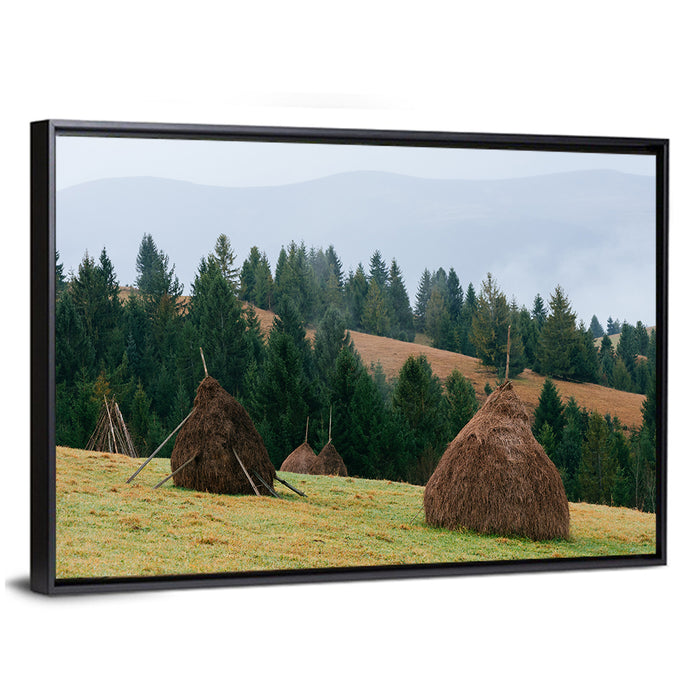 Haystacks in Mountain Village Wall Art as a framed canvas