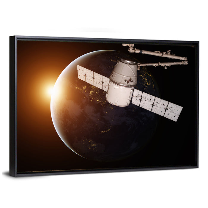 Satellite Over Earth at Sunrise Wall Art as a framed canvas