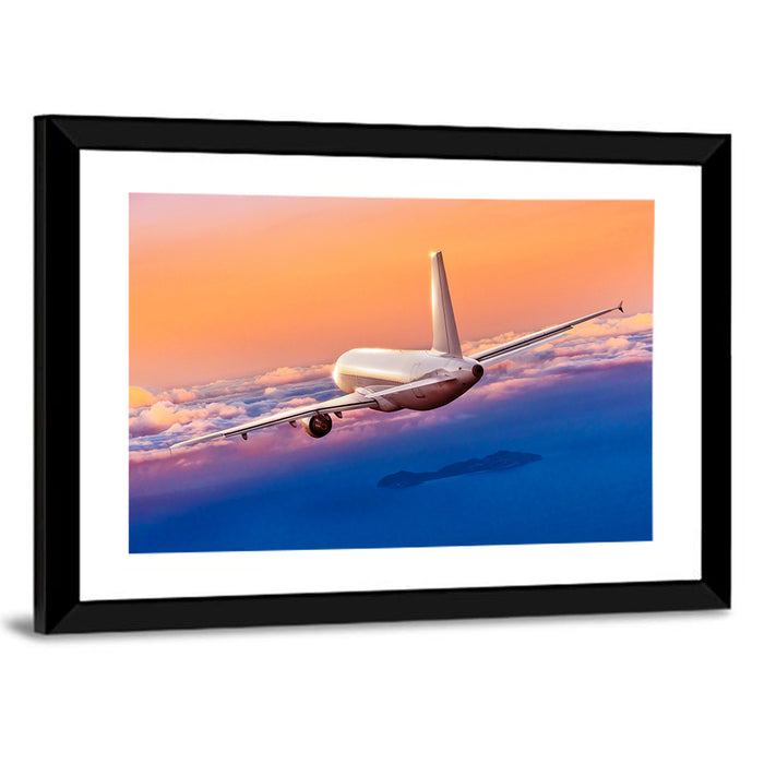 Airplane Over Clouds at Sunset Wall Art as a framed print