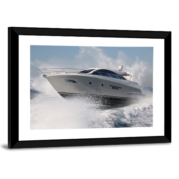 Motor Yacht Cutting Through Spray Wall Art as a framed print