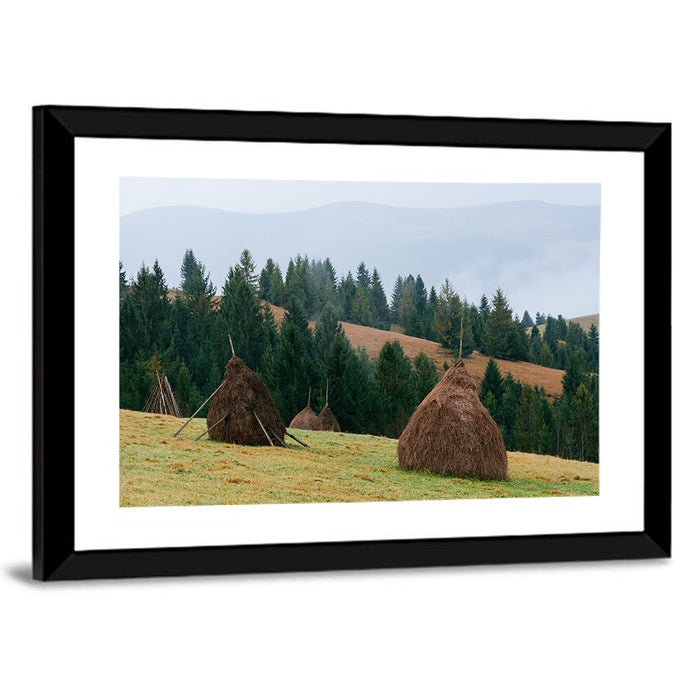 Haystacks in Mountain Village Wall Art as a framed print