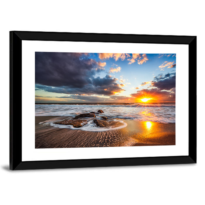 Sunrise Over Rocky Shore Wall Art as a framed print