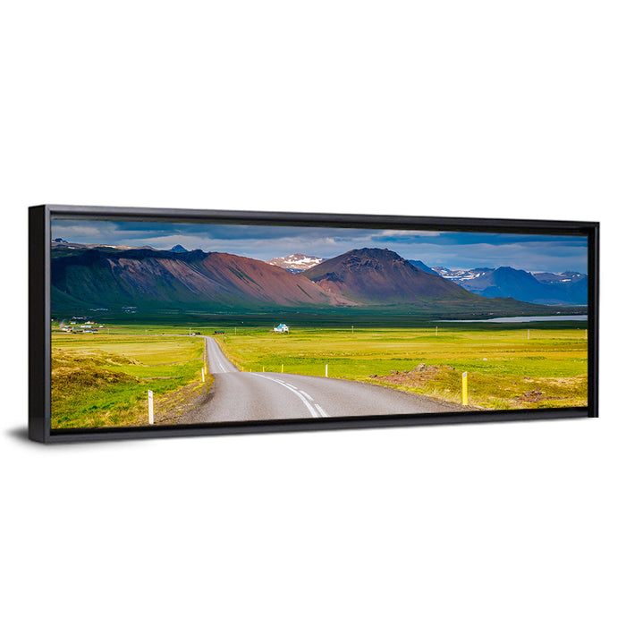 Icelandic Winding Road Toward Mountains Wall Art as a framed canvas