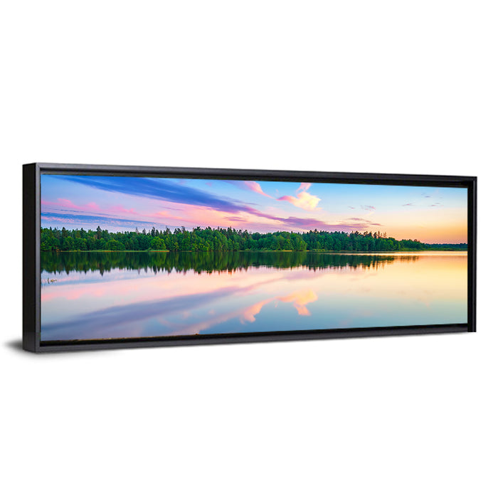 Colorful Sunset Over Forest Lake Wall Art as a framed canvas