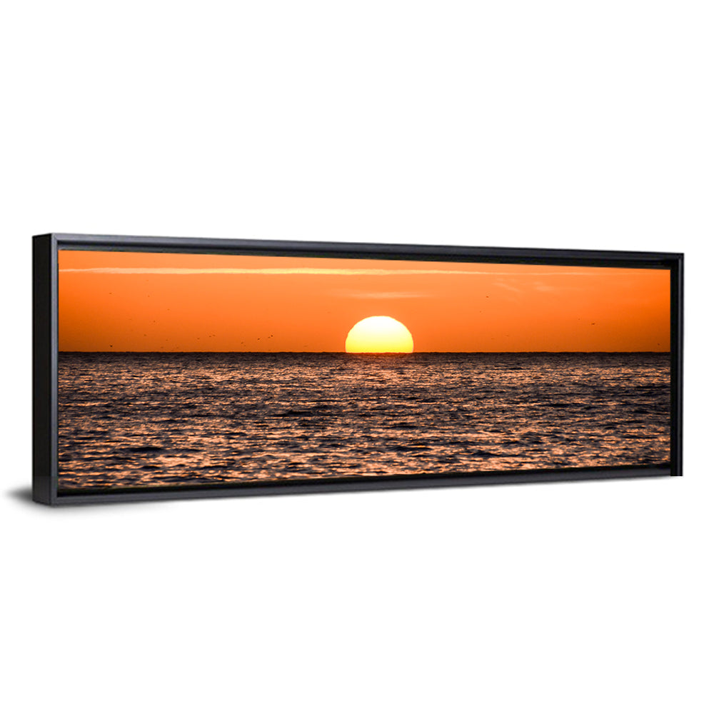Sun Setting In The Sea Wall Art