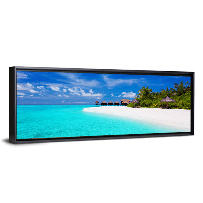 Turquoise Island with Water Bungalows Wall Art as a framed canvas