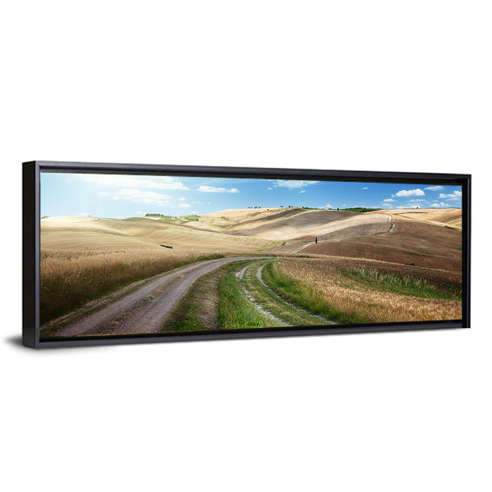 Dirt Road Through Tuscany Wall Art as a framed canvas