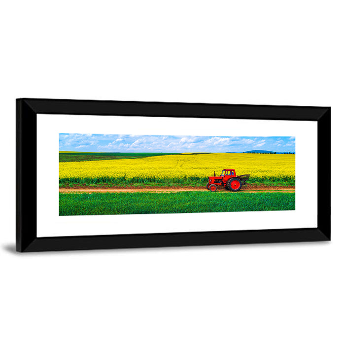 Red Tractor Over Yellow Rapeseed Field Wall Art as a framed print