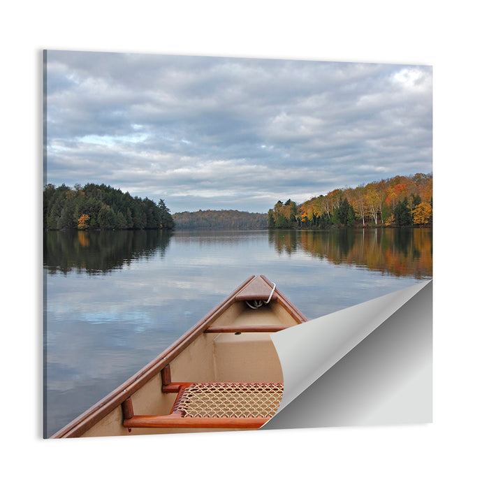 Overcast Canoe Bow on Autumn Lake Wall Art as a poster print