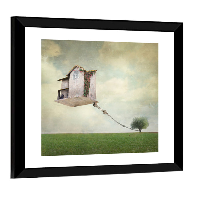 Floating House with Pulley Wall Art as a framed print