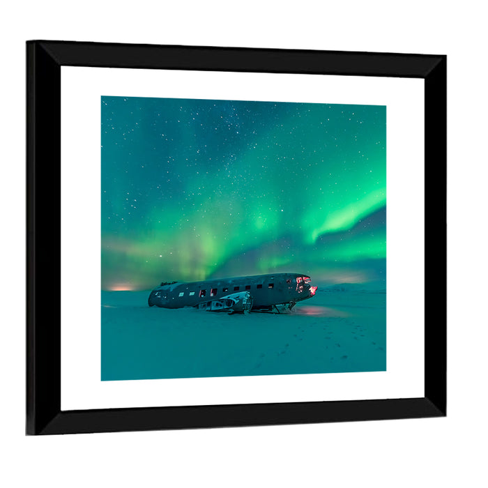 Northern Lights Over Sólheimasandur Wreck Wall Art as a framed print