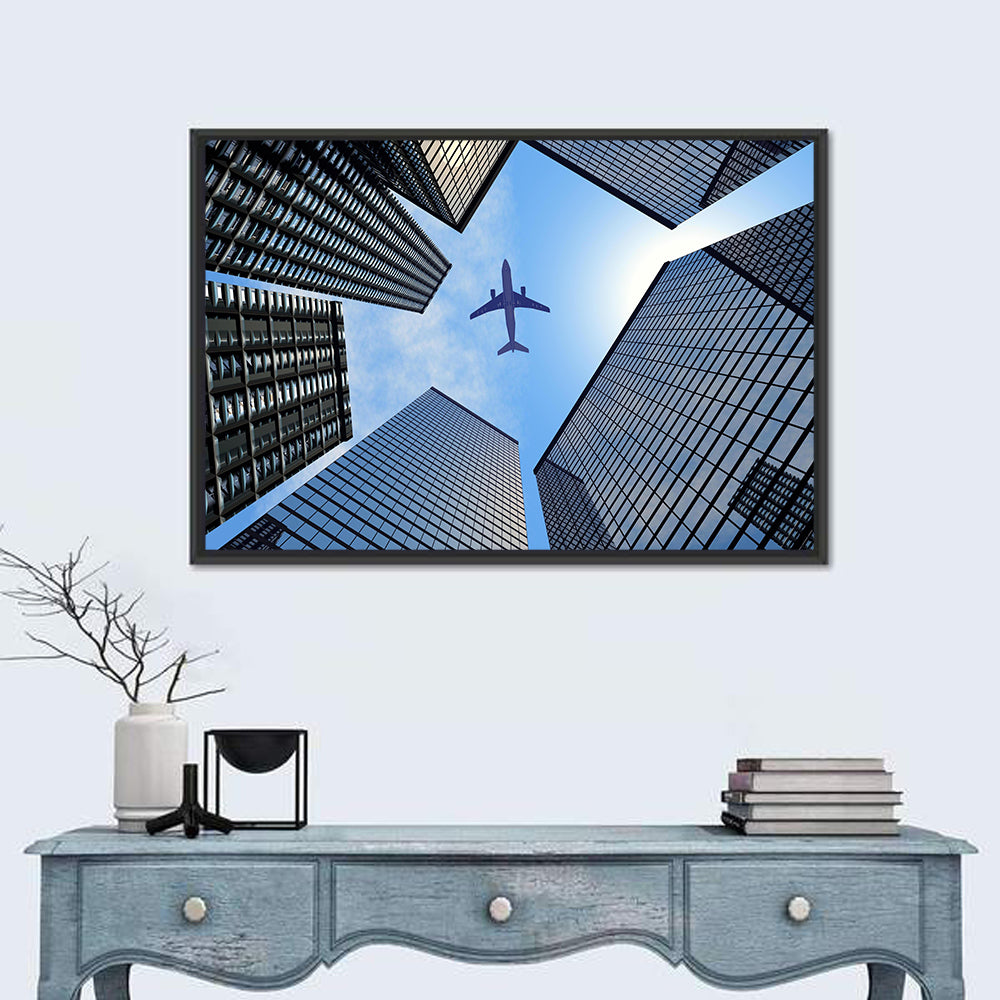 Airplane Above Skyscrapers Wall Art