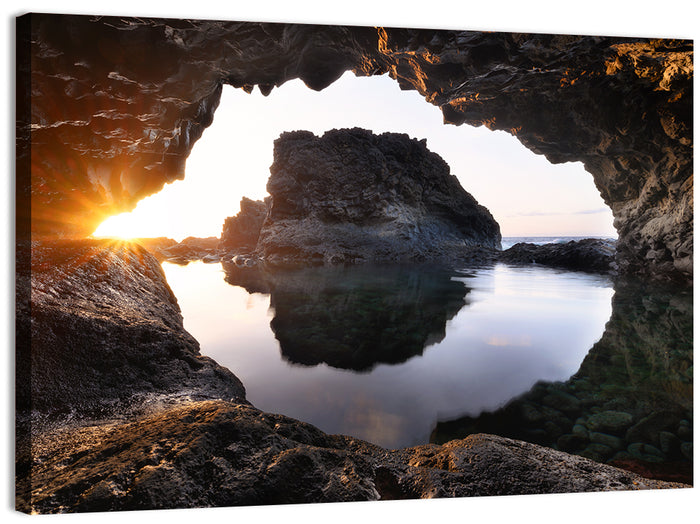 Sea Cave Sunset Wall Art as a canvas print
