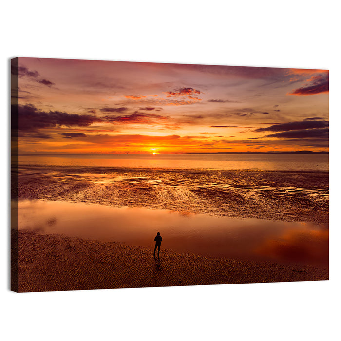 Solitary Figure on Sunset Shore Wall Art as a canvas print