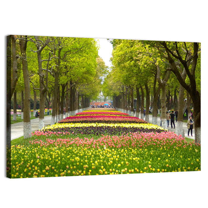 Tree-lined Tulip Garden Path Wall Art as a canvas print