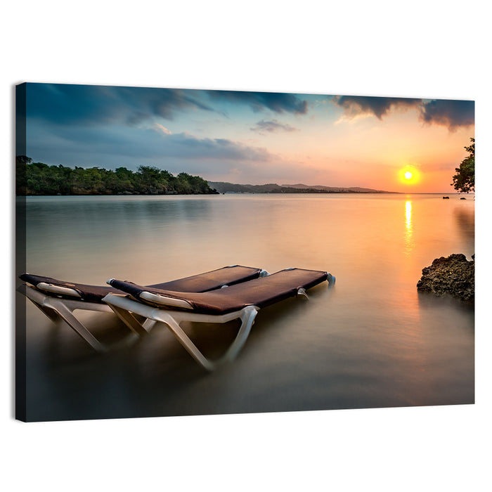 Sunset Over Coastal Lounge Chairs Wall Art as a canvas print