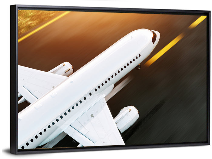 Commercial Jet Takeoff at Sunset Wall Art as a framed canvas