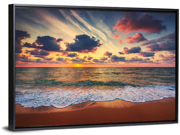 Golden Hour Beach Waves Under Cloudy Sky Wall Art as a framed canvas