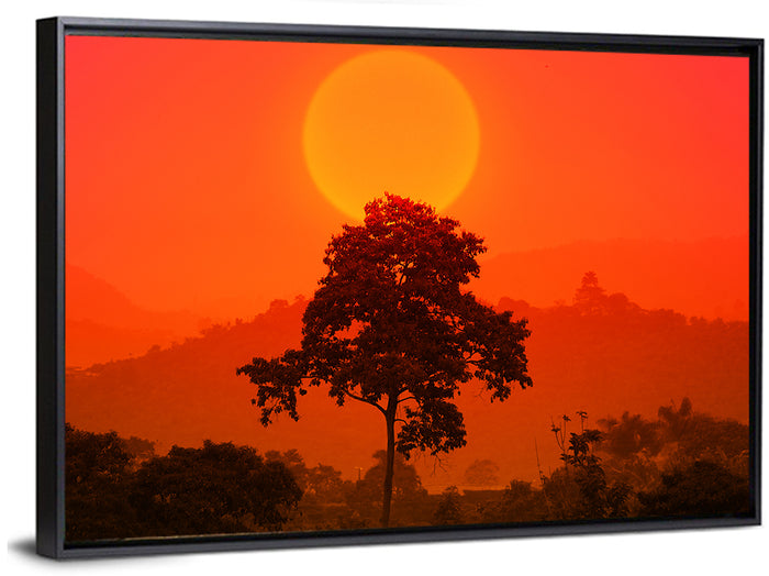 African Summer Sunset Wall Art as a framed canvas