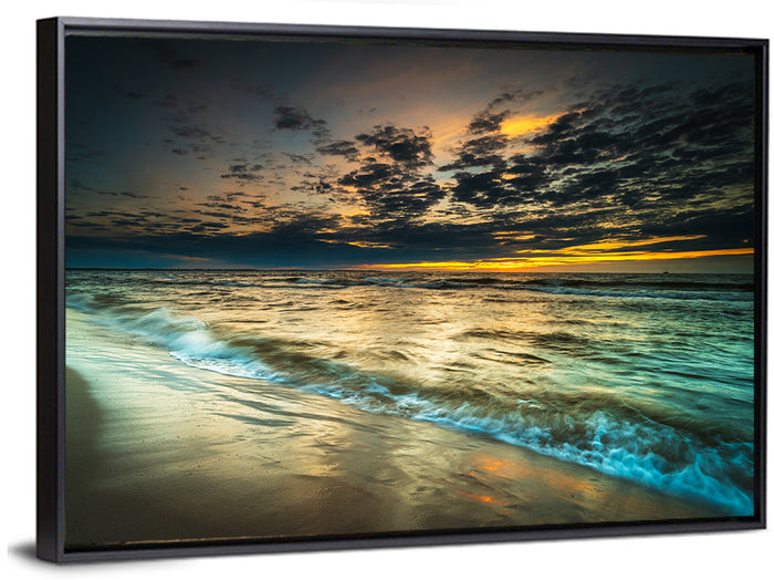 Shoreline Sunset with Boat Silhouette Wall Art as a framed canvas