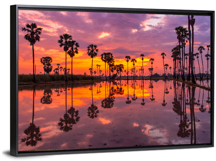 Palm Trees Sunset Reflection Wall Art as a framed canvas