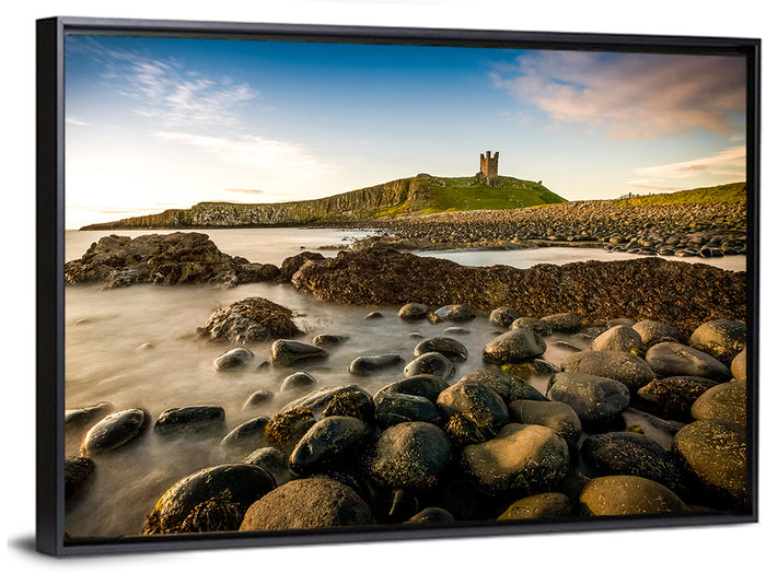 Dunstanburgh Castle at Golden Hour Wall Art as a framed canvas