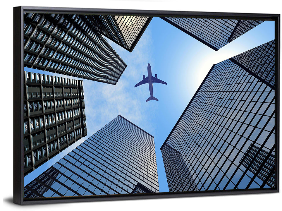 Airplane Above Skyscrapers Wall Art