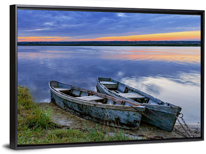 Chained Rowboats at Dusk Wall Art as a framed canvas