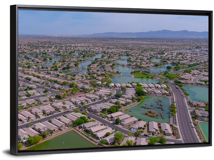 Aerial Desert Suburb with Lakes Wall Art as a framed canvas