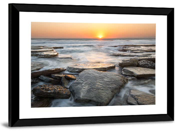 Golden Hour Rock Shoreline Sunset Wall Art as a framed print
