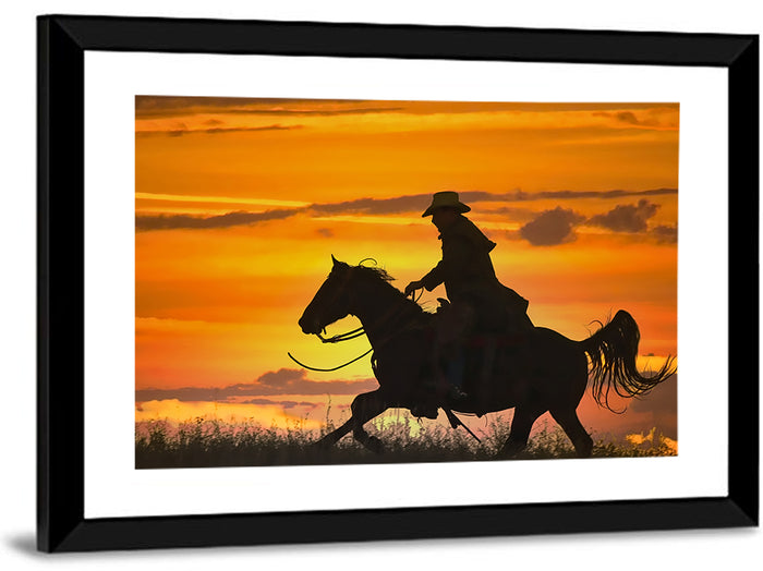 Cowboy and Horse at Sunset Wall Art as a framed print