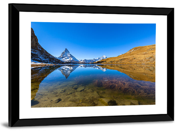 Matterhorn Reflected in Riffelsee Wall Art as a framed print