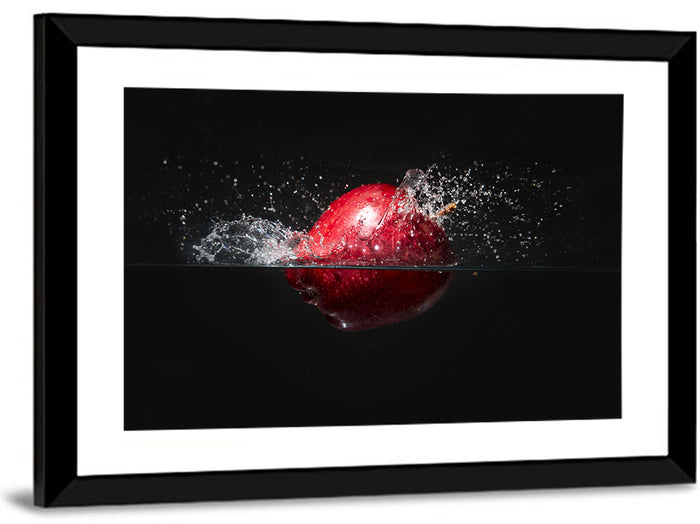 Red Apple Water Splash Wall Art as a framed print