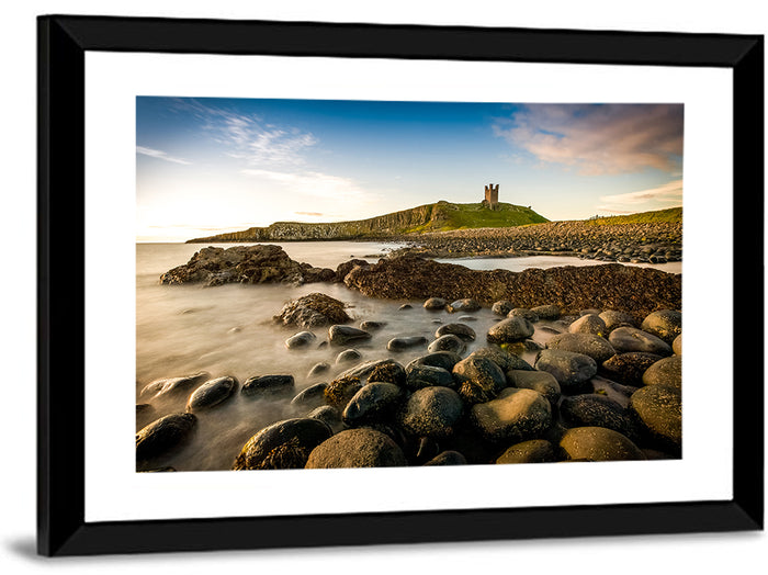 Dunstanburgh Castle at Golden Hour Wall Art as a framed print
