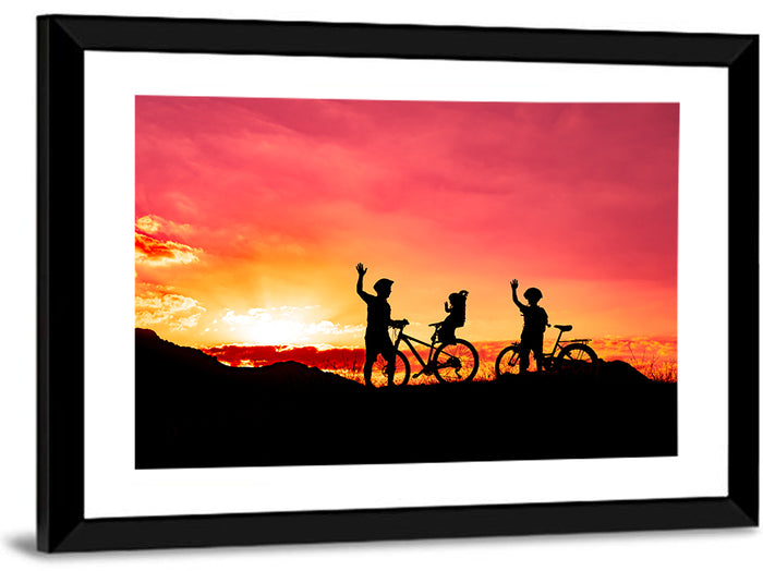Family Ride at Sunset Wall Art as a framed print
