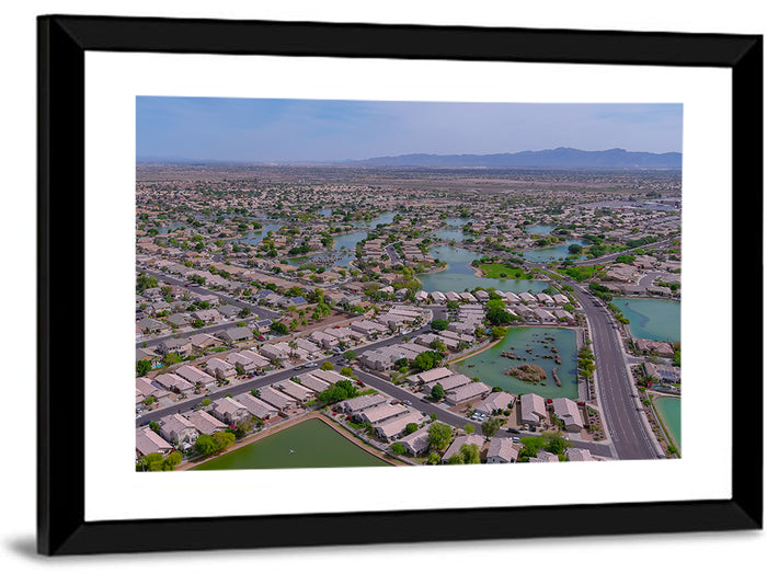 Aerial Desert Suburb with Lakes Wall Art as a framed print