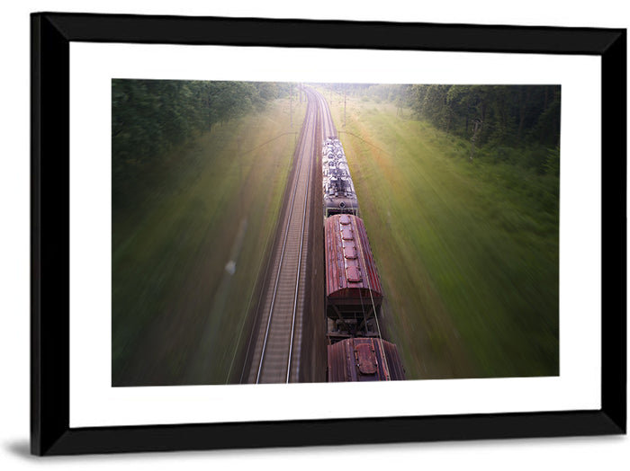 Freight Train Through Forest Wall Art as a framed print