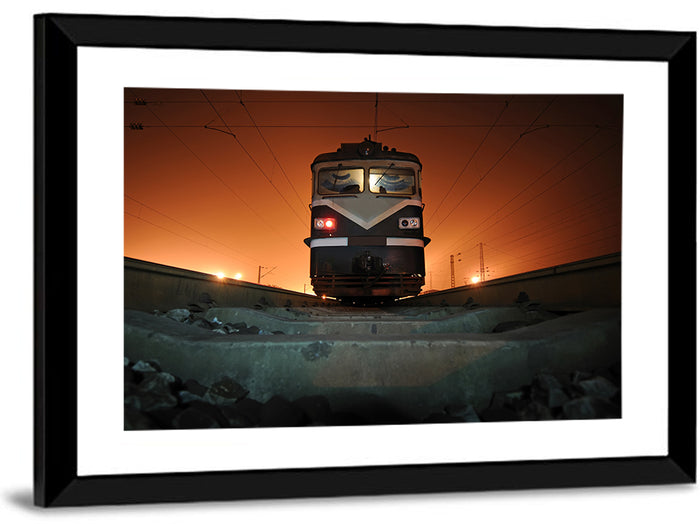 Cinematic Night Electric Locomotive Wall Art as a framed print