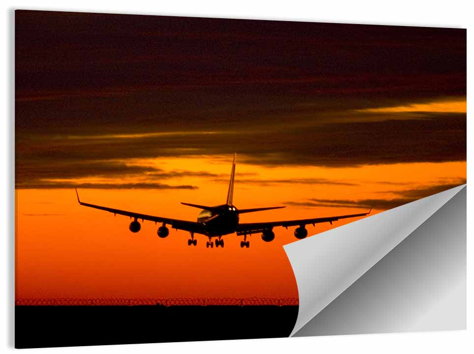 Plane Landing at Sunset Wall Art