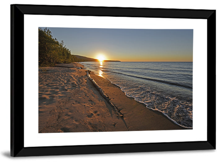 Lake Superior Driftwood Beach Sunset Wall Art as a framed print