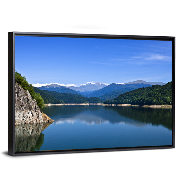 Cliffside Mountain Lake Reflection Wall Art as a framed canvas