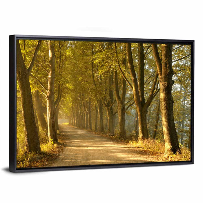 Autumn Road Through Golden Forest Wall Art as a framed canvas