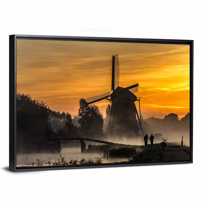 Misty Windmill at Sunrise Wall Art as a framed canvas