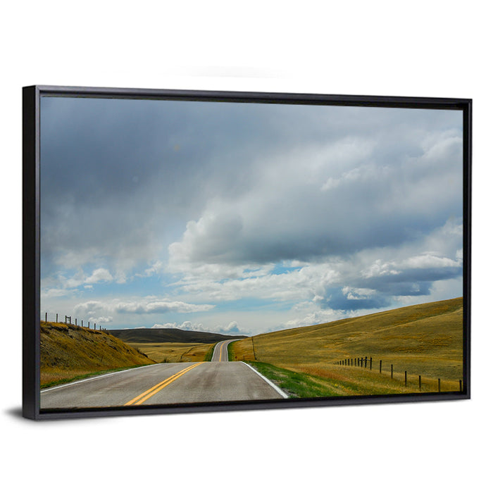 Montana Road Through Golden Hills Wall Art as a framed canvas